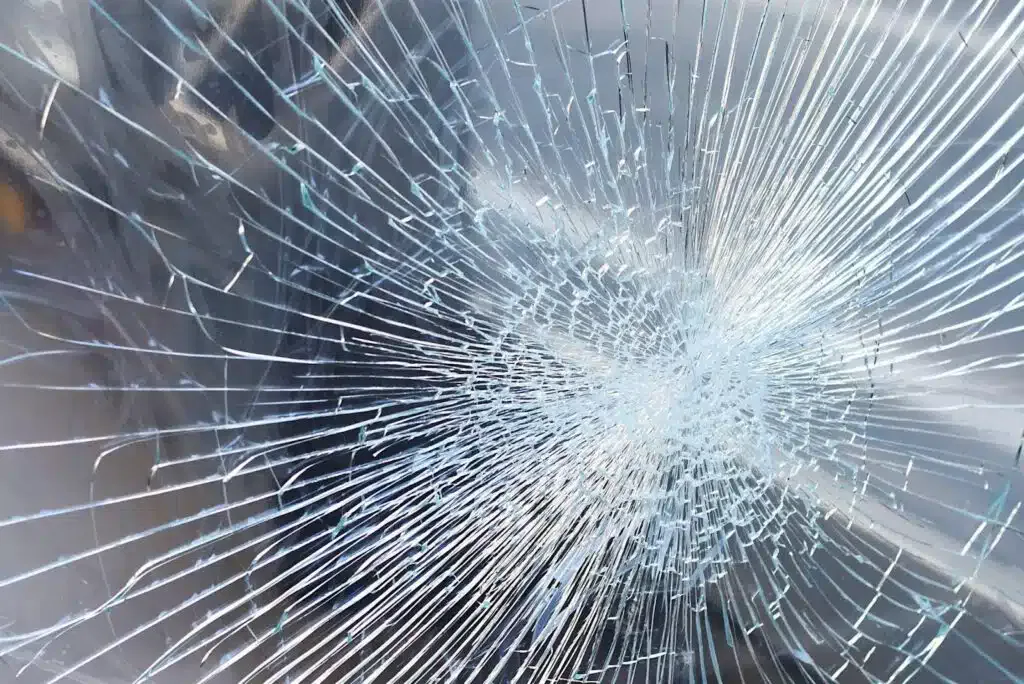 A cracked glass window, showcasing its fragility