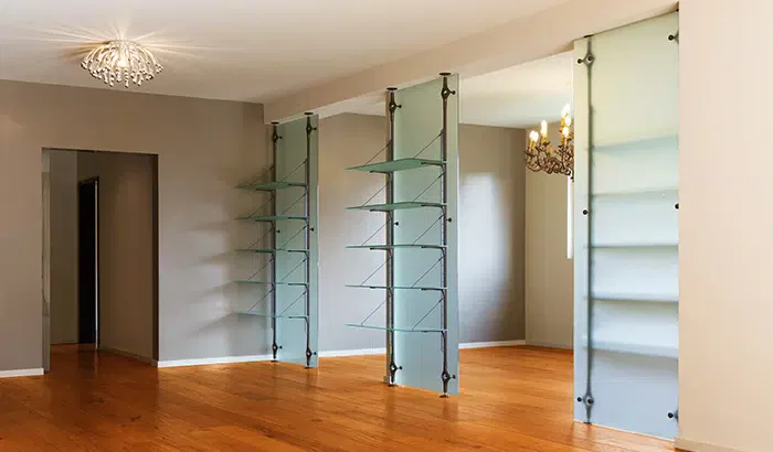 Here’s How to Style Glass Shelves in Your Home
