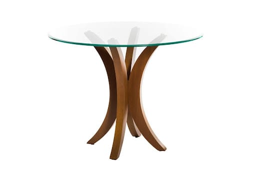A round glass table with a wooden base, elegantly designed to enhance any modern living space.