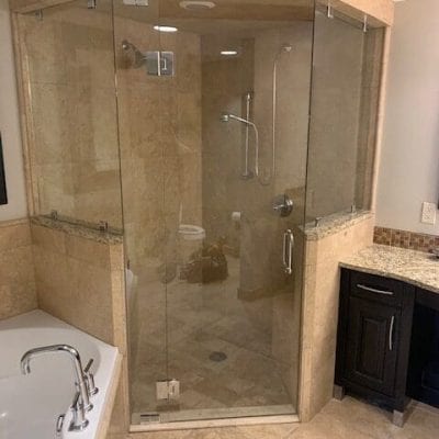 Luxurious bathroom featuring shower and tub.