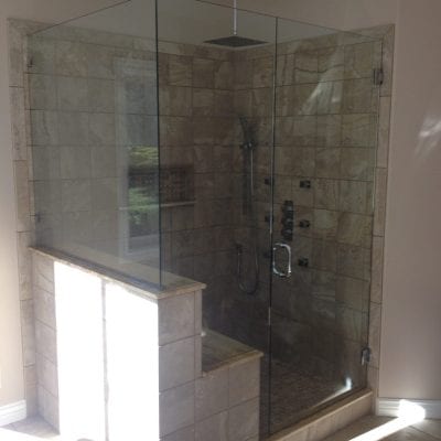 Bathroom with a glass shower door.
