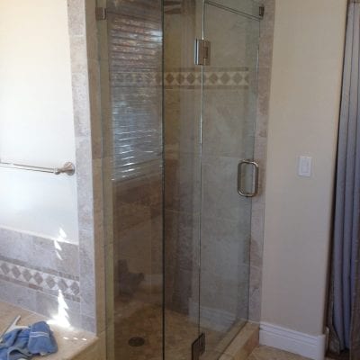 Spacious bathroom with walk-in shower and tub.